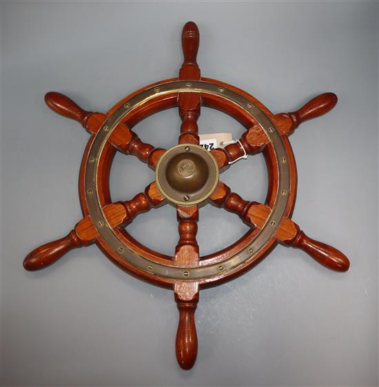 A small Simpson Lawrence teak ships wheel length 51cm